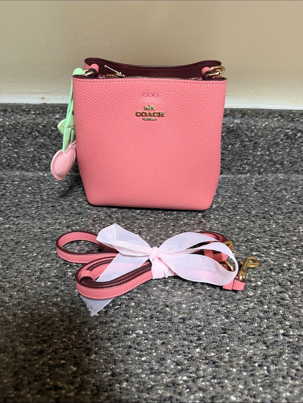 Coach Pink bucket bag Crossbody with unbranded Charm
